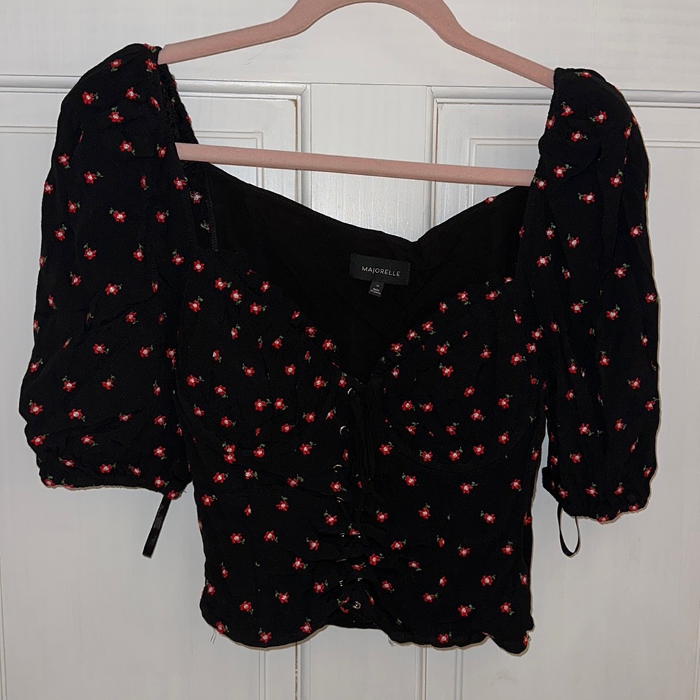 Black top with flowers details